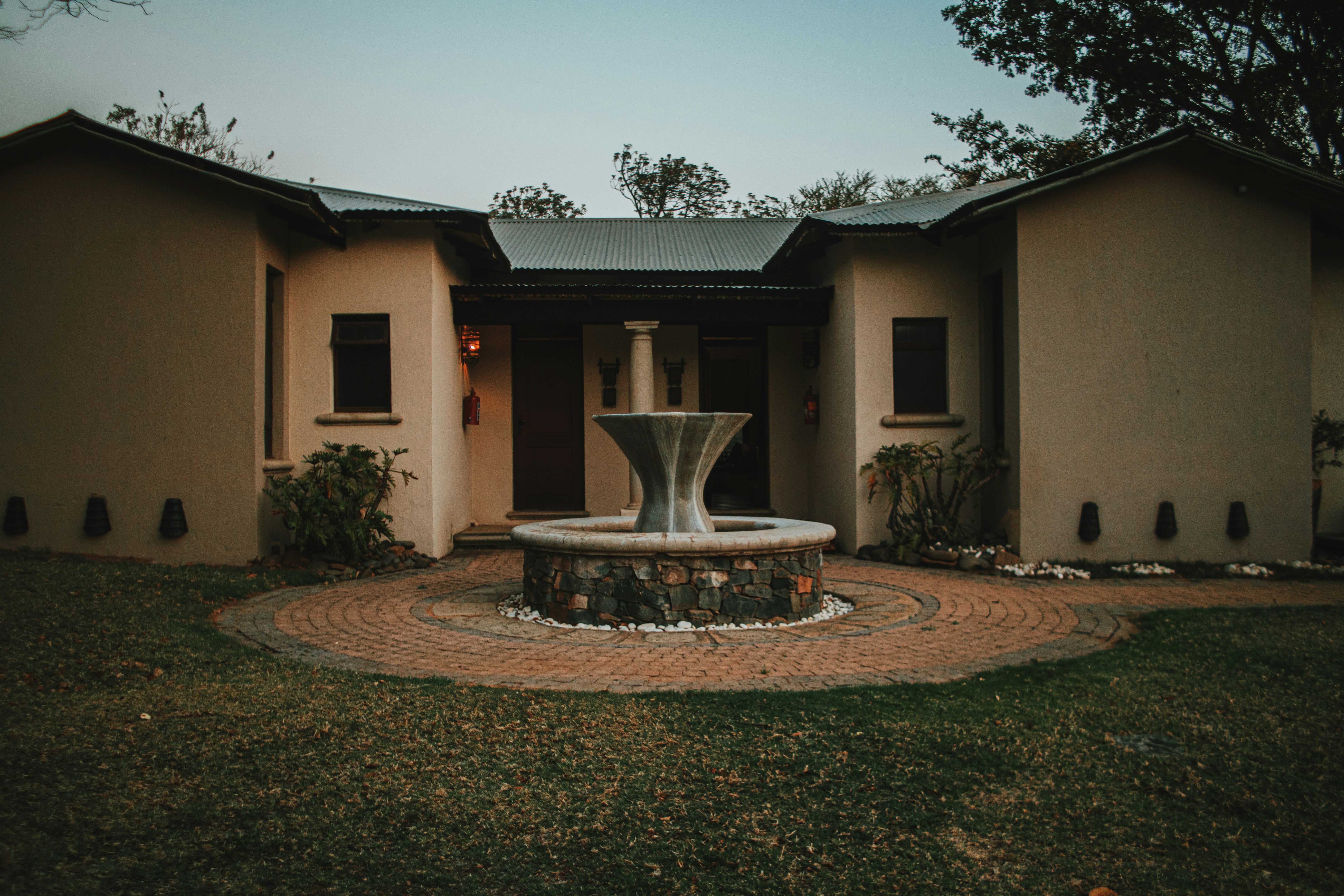 Welcoming South African lodge courtyard and accommodation